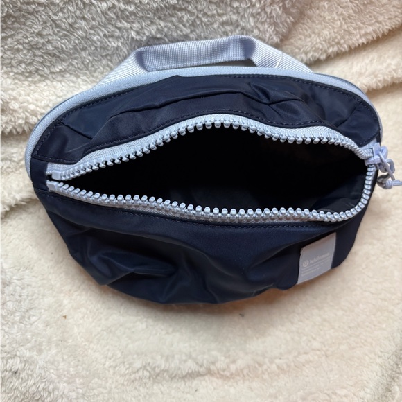dark blue lululemon belt bag Everywhere Crossbody 1L lululemon belt bags are here!